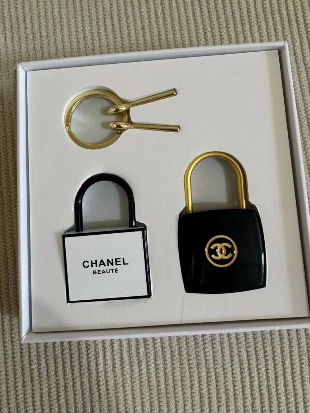 CHANEL Black and Gold Signature Padlock Charm Set